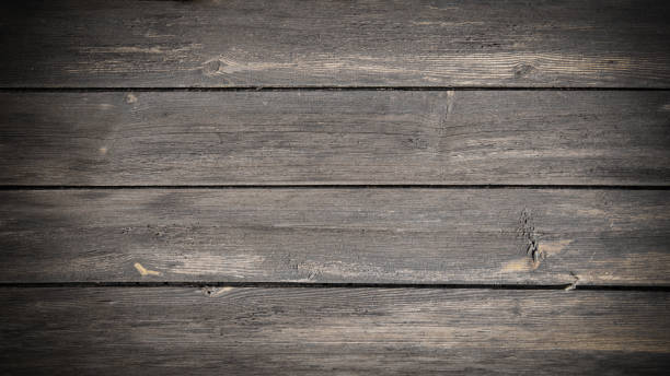 istock Old brown rustic weathred dark grunge wooden timber table wall floor board texture - wood background banner top view 1429568219