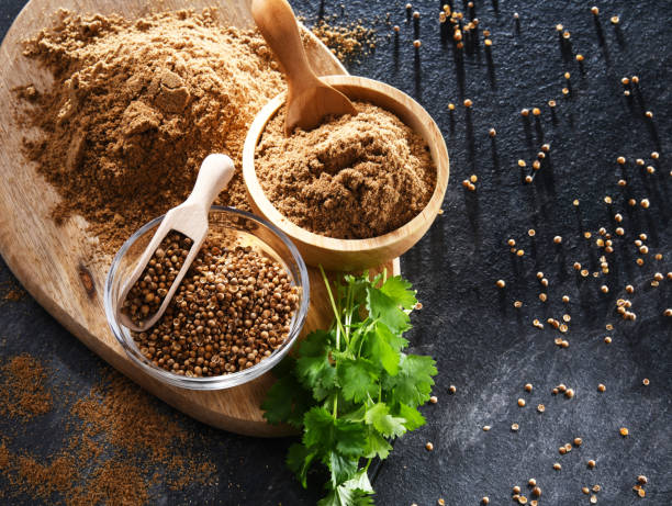 istock Ground coriander, its dried seeds and fresh leaves 1429573452