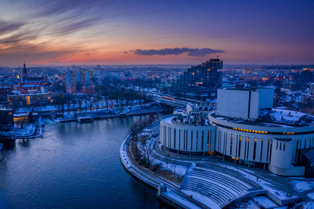 Opera Nova in Bydgoszcz in winter at dusk, aerial view of Poland