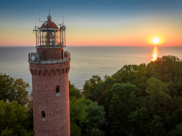 istock Lighthouse at sunrise by Baltic sea in Poland. 1429575318