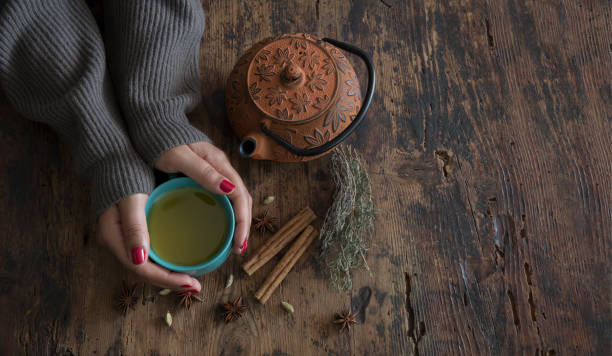 istock Woman's hands with cup of coffee or tea 1429593216