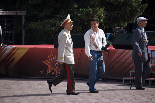 Almaty with some people beside the anual victory day, celebratet on 9.5. The image was captured during springtime.