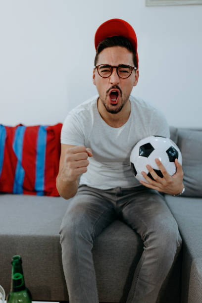 istock Man excited about a sports match 1429601417