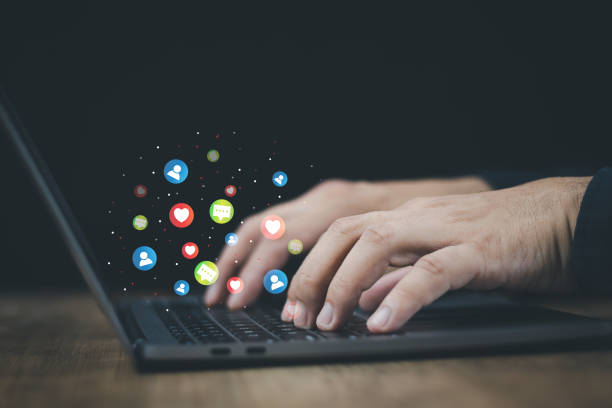 istock technology concept social media man using computer access online media Through the Internet, there is marketing to answer customer chats. by working at home 1429605266