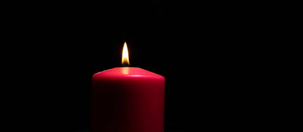 istock Moody burning red candle 1429608304
