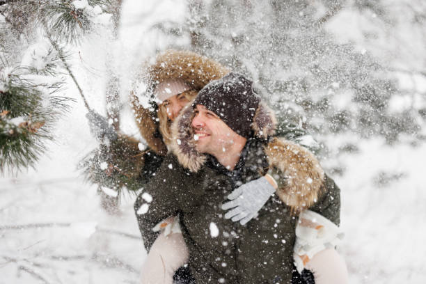 Free Stock Photo of Man and Woman Hugging in the Snow | Download Free ...