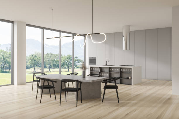 istock Stylish kitchen interior with eating table, bar countertop and panoramic window 1429614785