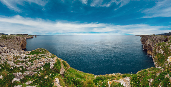 Bay of Biscay summer rocky coast view, Spain, Asturias, near Camango. Six shots stitch high-resolution panorama.