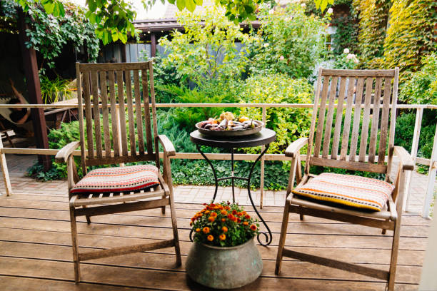 istock a small round table for tea drinking and two wooden armchairs on the terrace 1429624100