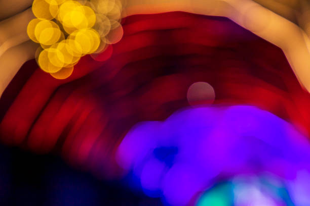 Golden red Purple Defocus Abstract bokeh light effects on the night black background texture