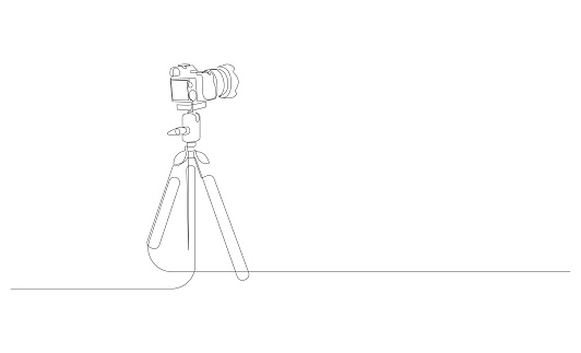 Continuous line drawing of the camera on a tripod. Vector illustration