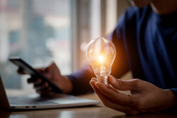 istock Close up hand choose light bulb or lamp with bright for human resources or leadership and creativity thinking idea motivation or vision and knowledge learning. 1429636123