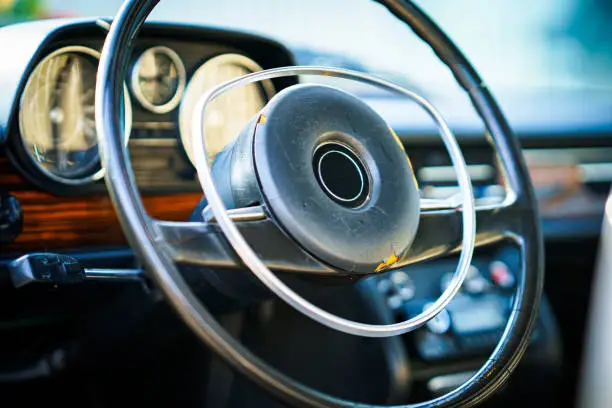 Details and close-up photos of a vintage wedding car with authentic details, Soft focus