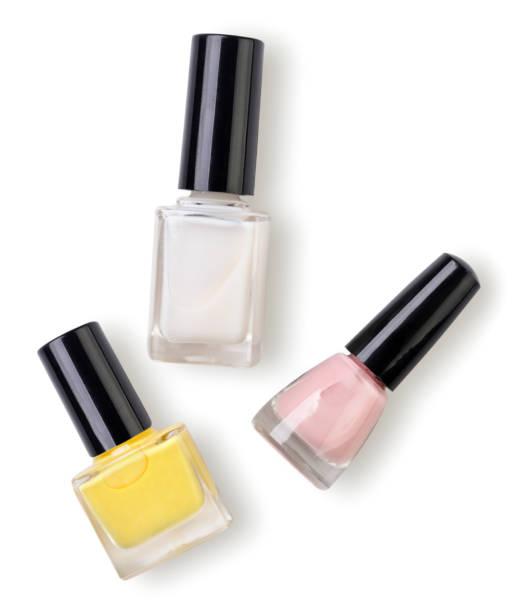istock Nail polish in different bottles on a white. Top view 1429641918