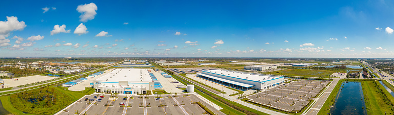 Fort Myers, FL, USA - October 1, 2022: Aerial panorama drone photo of the Fort Myers FL Amazon distribution warehouse
