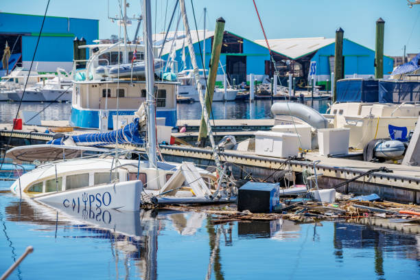 Sunken boats in Fort Myers FL after Hurricane Ian Fort Myers, FL, USA - October 1, 2022: Sunken boats in Fort Myers FL after Hurricane Ian hurricane ian stock pictures, royalty-free photos & images