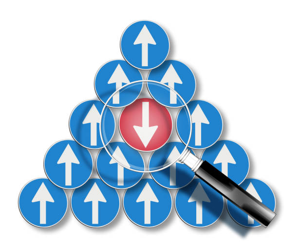 istock Countercurrent metaphor with red arrow goes against - Concept seen through a magnifying glass 1429643381