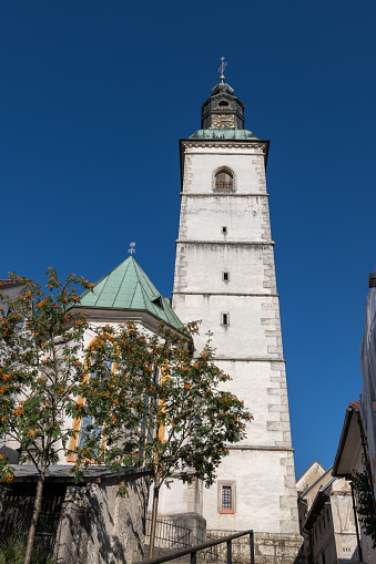 Bell tower of the St. Jacob Church in city of Skofja Loka, Slovenia.