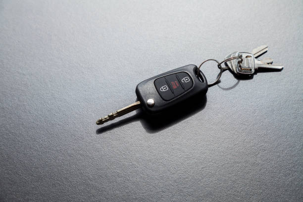 istock Car key on top of a black table with natural light 1429645858
