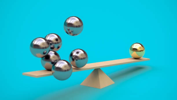 istock One gilded ball outweighs several metal balls on a swing. 3D rendering. Minimalism. Abstraction. Balance concept. Not like everyone else 1429646761