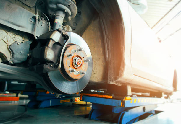 istock Front disc brakes and calipers that remove the wheels of a car 1429647010