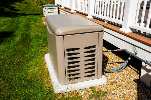 Residential generator Residential standby generator on concrete pad generator stock pictures, royalty-free photos & images