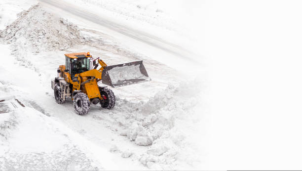 istock Snow clearing. Tractor clears the way after heavy snowfall. 1429661189