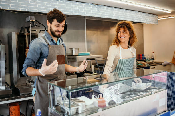 istock Two people working in food truck 1429664276