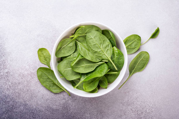 istock Green fresh baby spinach 1429664790