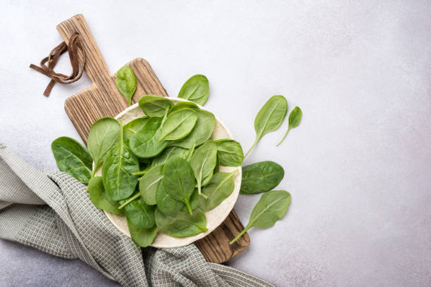 istock Green fresh baby spinach 1429664836