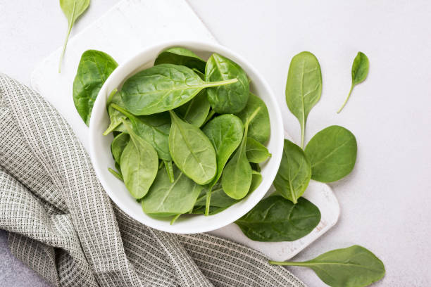 istock Green fresh baby spinach 1429664903
