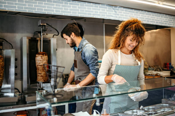 istock Two people working in food truck 1429665638