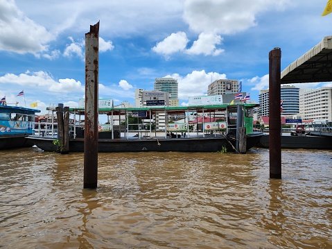 Chao Phraya River is an important river in Thailand. In the rainy season, there is a lot of water, causing the water to turn red. There is a passenger ferry. Bangkok, Thailand. 2022-10-02