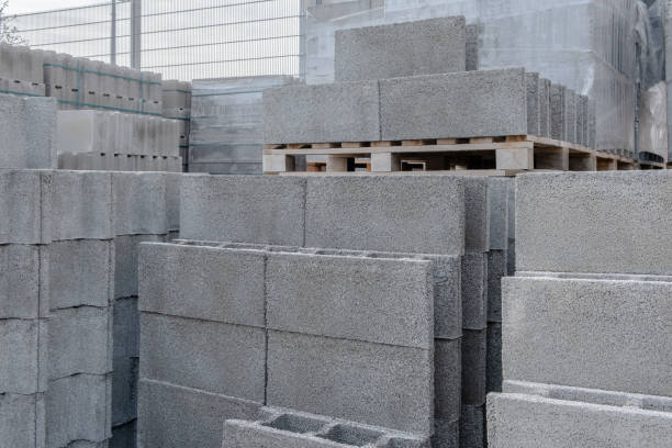 istock Stack of cement concrete Building cinder blocks brick on pallete in hardware store 1429674023