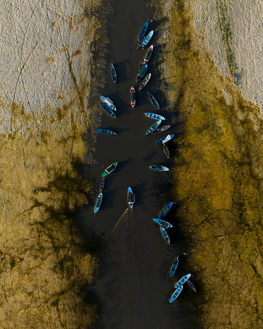 Fishing boats standing on the Acigol (Acıgöl) lake. Denizli, Turkey. Taken via drone.