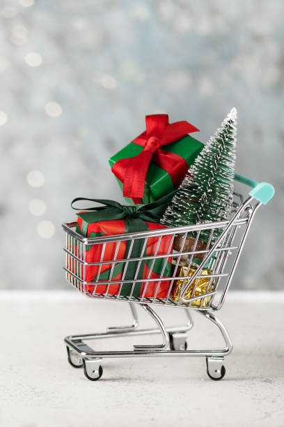 istock Shopping cart with Christmas presents. 1429686830