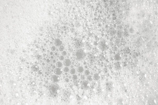 istock Close up cleansing white foam texture while using surfactant washing, cleaning concept 1429690248