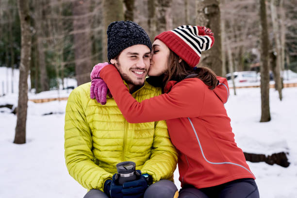 istock Kissing athletic couple after winter workout 1429693010
