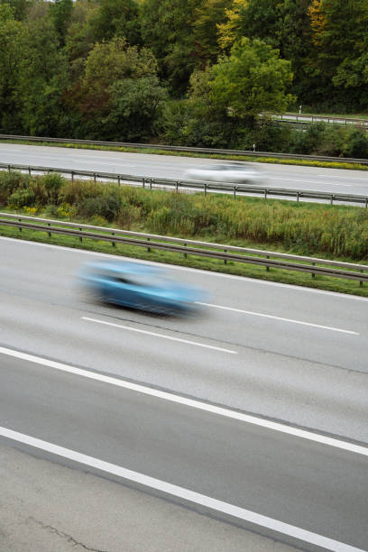 istock Fast cars on a highway 1429700864