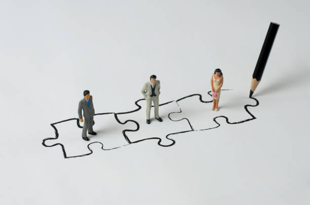 senhor dos fantoches: trabalho em equipe 1 - figurine puzzle people business - fotografias e filmes do acervo