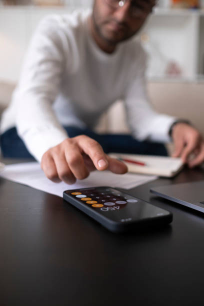 Man Using Inflation Calculator 1,100+ Private Inflation Stock Photos, Pictures & Royalty-Free Images ...