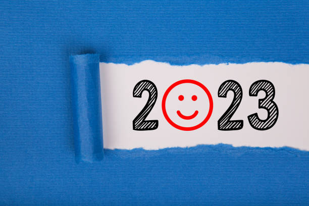 istock Torn Paper With Happy New Year 2023 On White Background 1429715113
