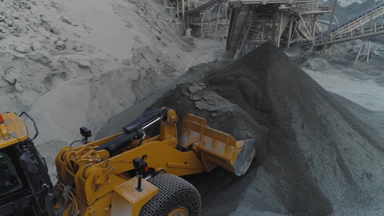 Aerial view of Wheel Loader loads rubble into the truck