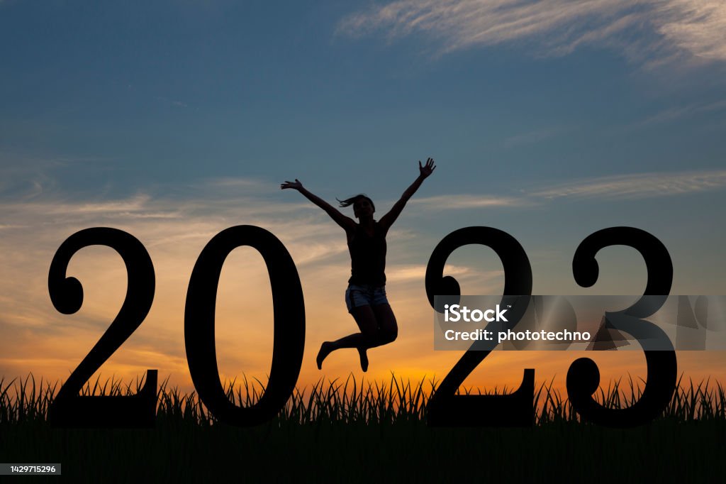 Silhouette young woman happy for 2023 new year 2023 Stock Photo