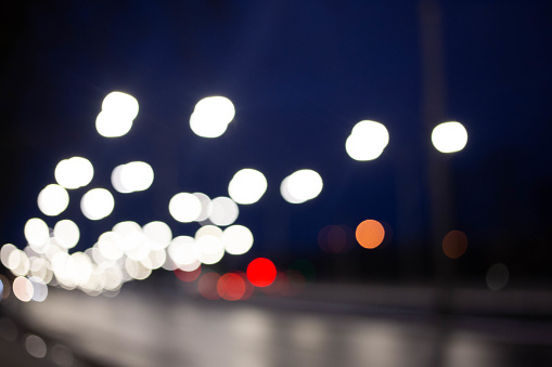 Blurred Defocused Lights of Heavy Traffic on a Wet Rainy