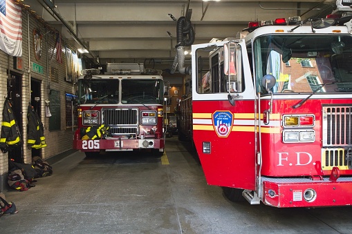 Brooklyn, NY, USA - Oct 2, 2022: FDNY 205/Ladder 118 at 74 Middagh St garage on a sunny Fall day