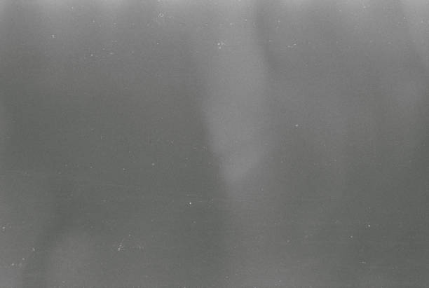 400 Iso Black and white film grain background stock photo