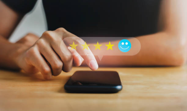 istock customer services best excellent business rating experience. Satisfaction survey concept. Hand of people chooses  smile face circle on mobile. 5 Star Satisfaction 1429733407