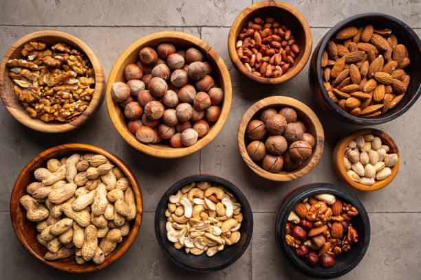 istock Assortment of nuts in bowls 1429741426