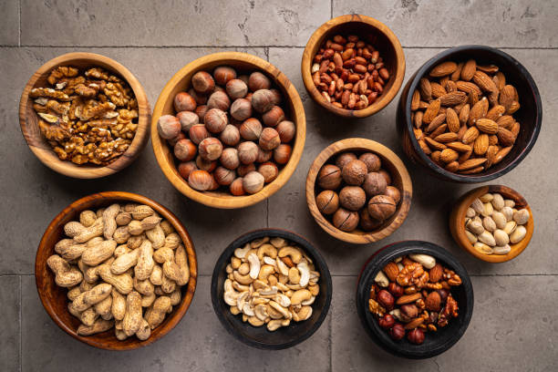 istock Assortment of nuts in bowls 1429741438